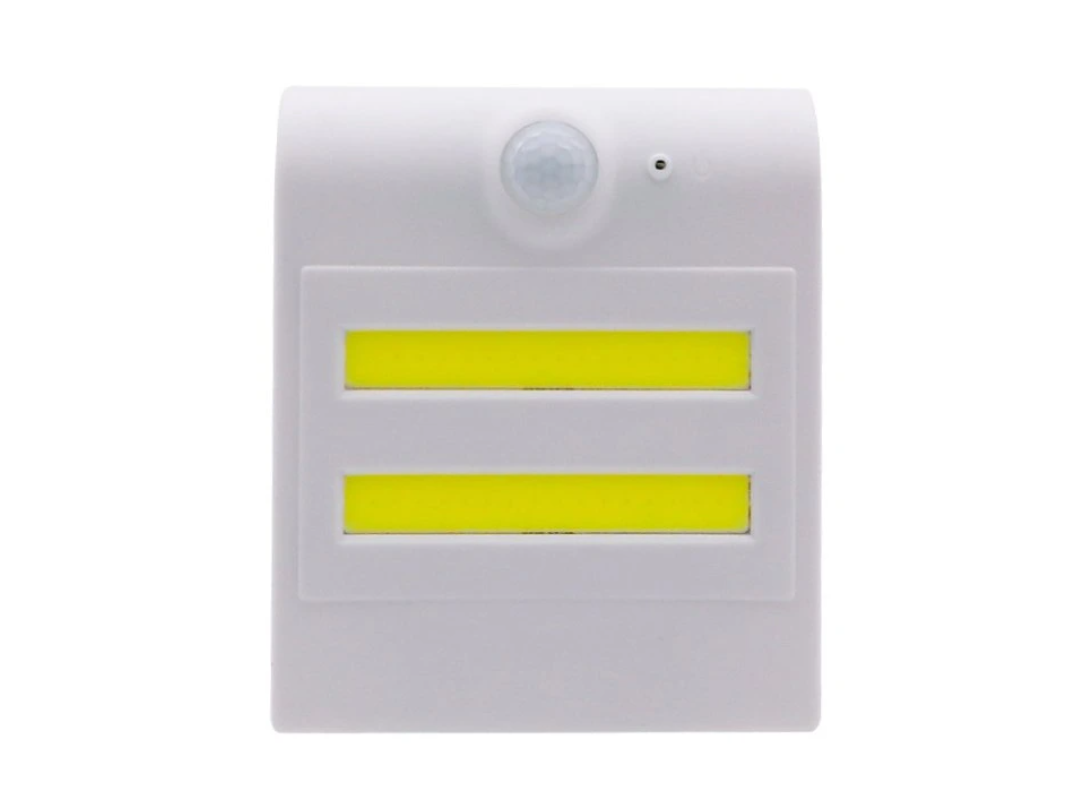 Sensore di movimento bianco con luci LED gialle per automazione casa smart